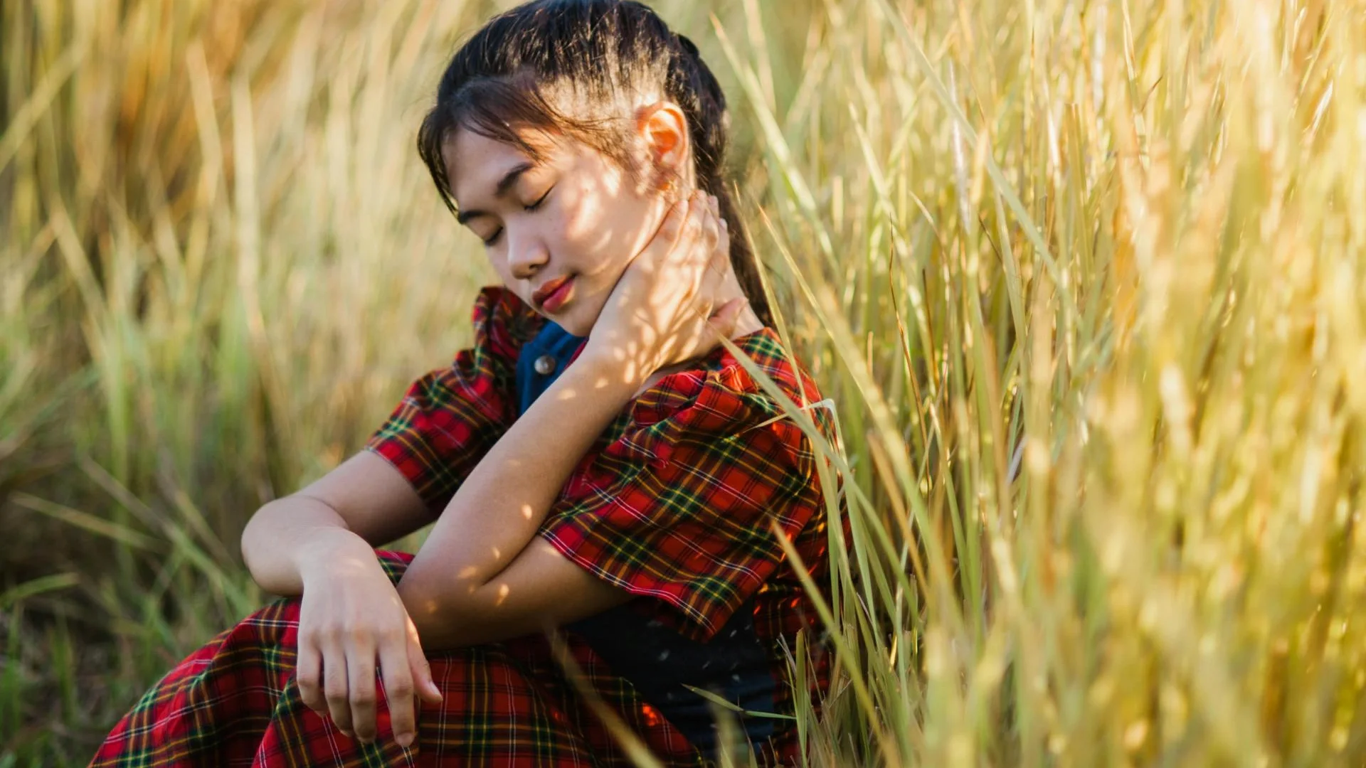 Serene teen girl resting peacefully in nature