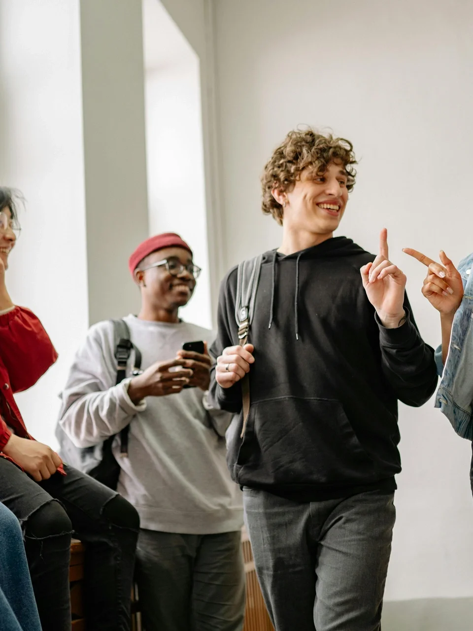 Diverse group of friends engaged in a lively conversation together