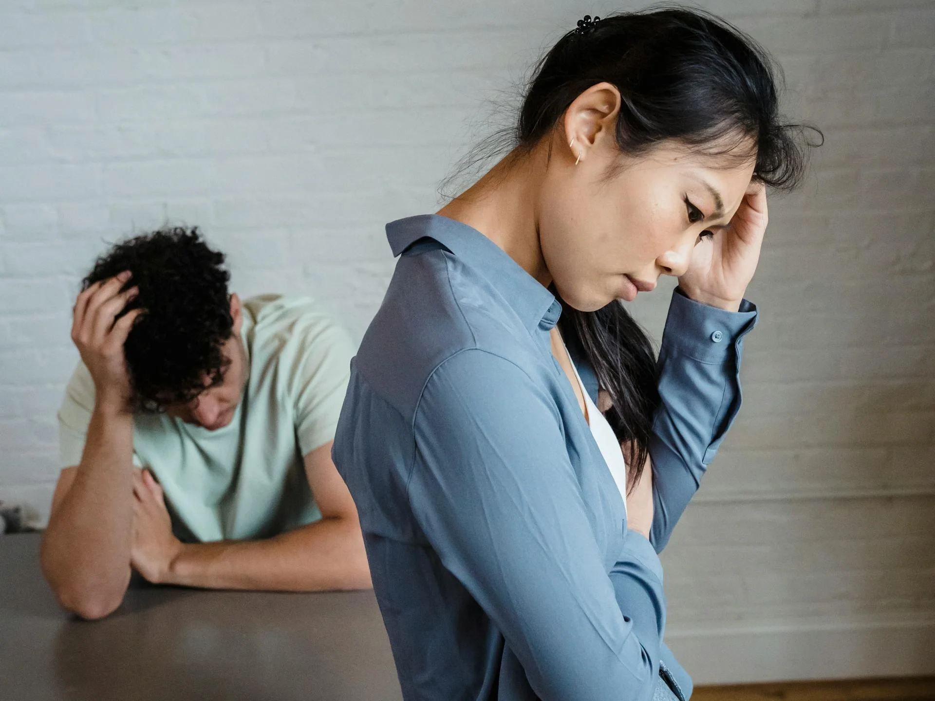 Couple in a tense discussion, depicting emotional conflict